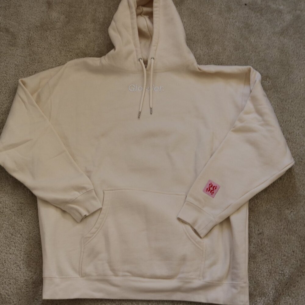 Glossier Off-White Hoodie with Pink Detail